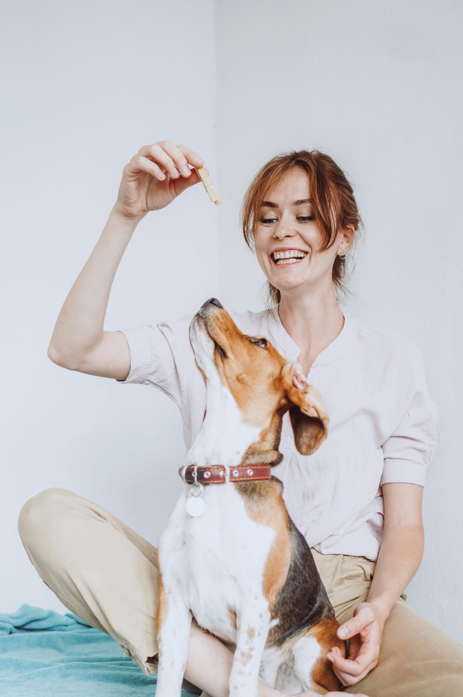 Woman Giving Her Dog Treats